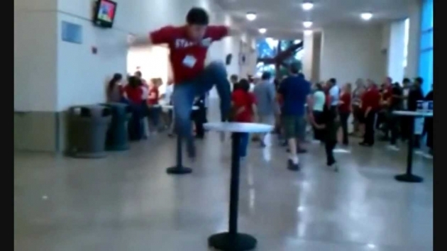 Classy Guy Jumps From Stairs To Table Picture